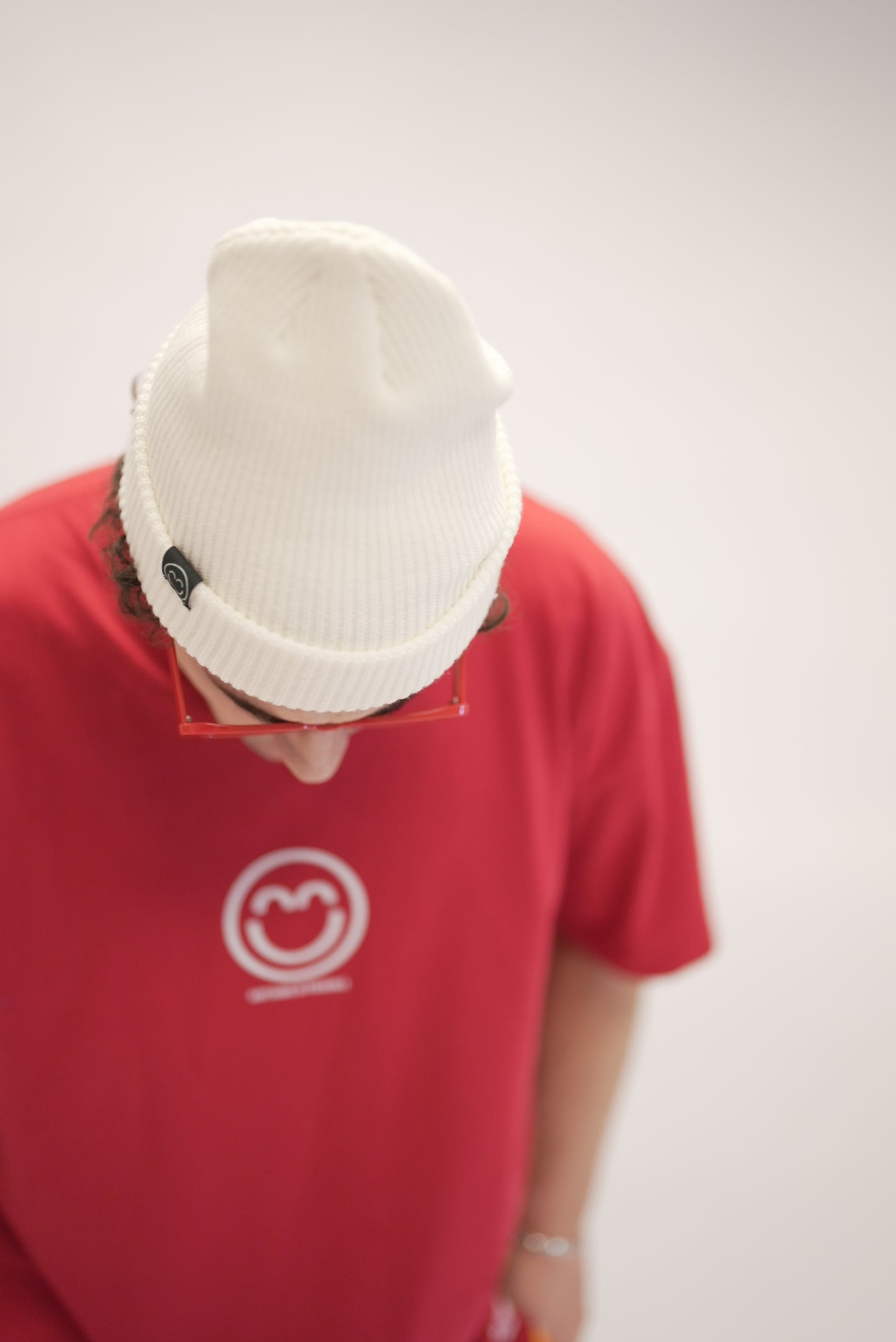 Beige Smile Beanie with Black Tag