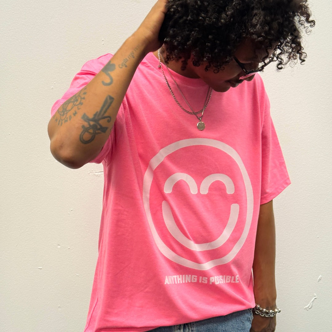 “Anything Is Possible” Pink Relief Smile Shirt