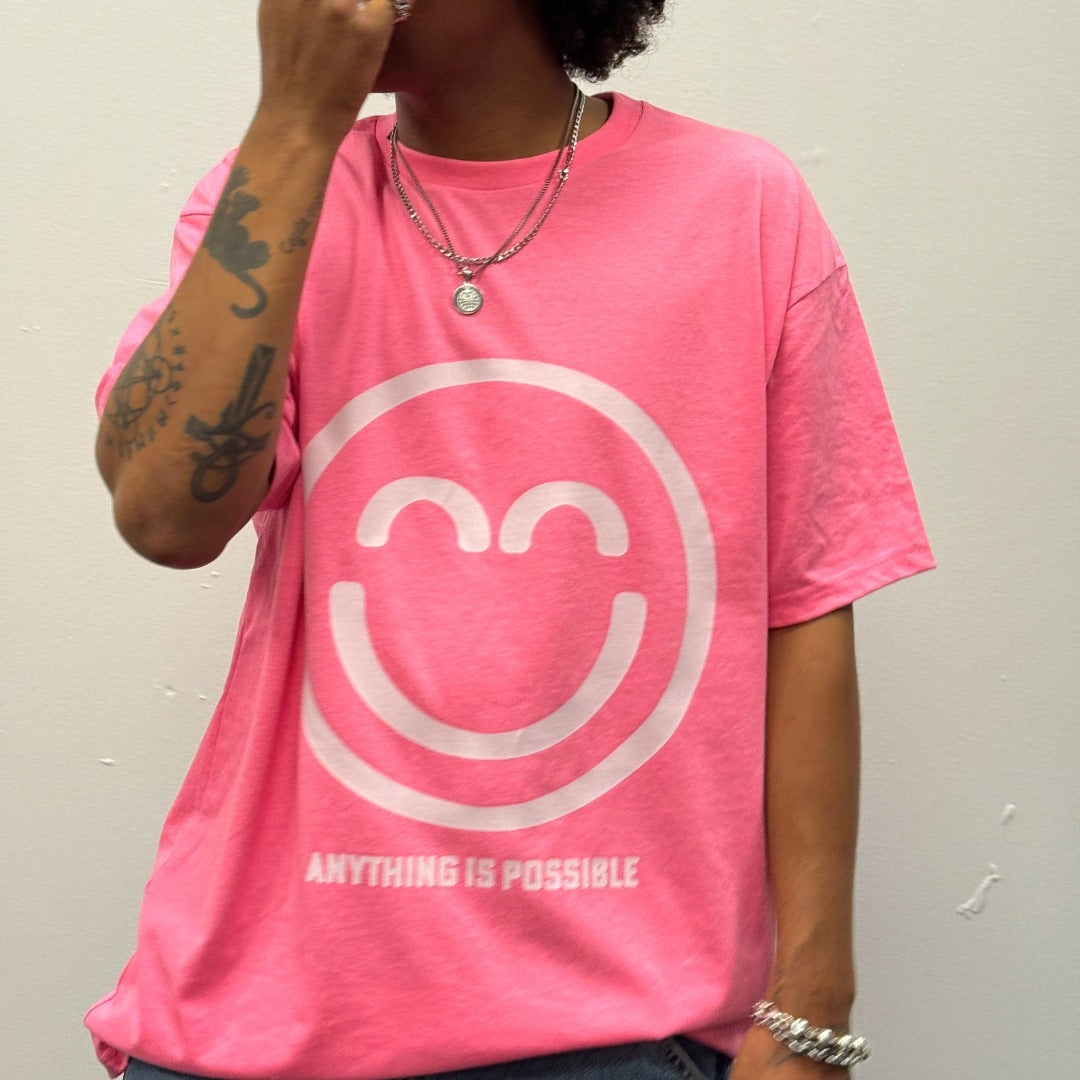 “Anything Is Possible” Pink Relief Smile Shirt